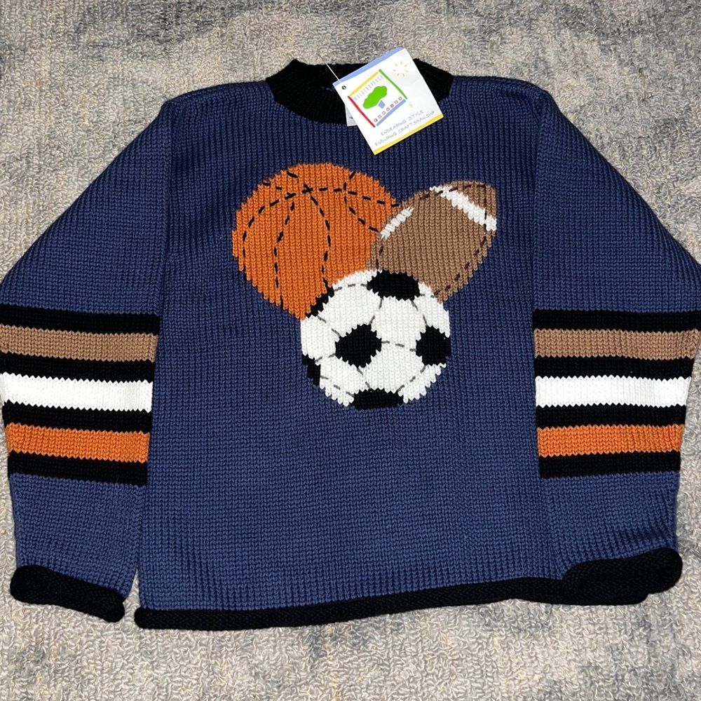 Thick knitted sports sweater. Mulberribush brand from a boutique.